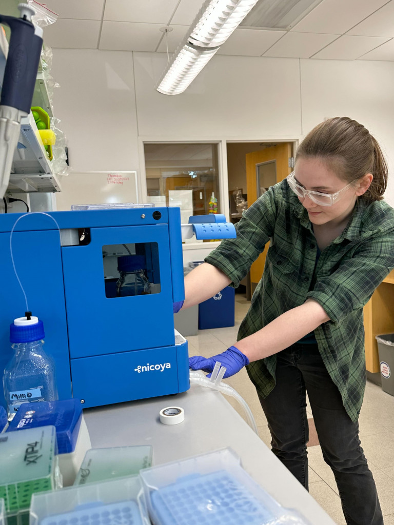 Researcher Eliza working with OpenSPR-XT in the lab. 