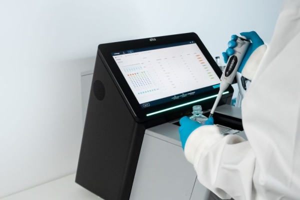 Nicoya Alto Digital SPR with scientist pipetting